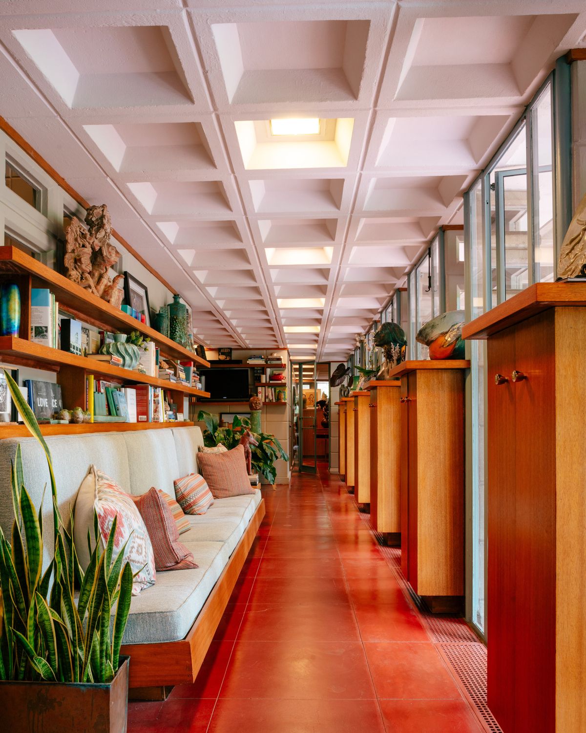 A main hallway, known as the “gallery”, of The Dorothy H. Turkel House, a home designed by Frank Lloyd Wright in Detroit, June 20, 2025. A conservancy that aims to preserve the work of Frank Lloyd Wright also serves as a sort of secret weapon for homeowners who need to troubleshoot maintenance issues. (Nick Hagen/The New York Times) (NICK HAGEN)