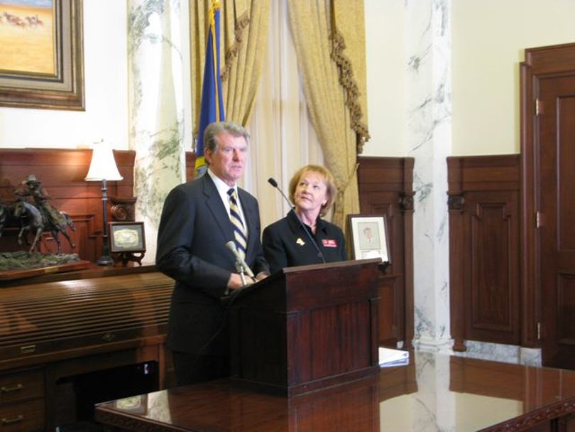 Gov. Butch Otter and state Parks Director Nancy Merrill announce a plan to trim costs at the state parks department, but not eliminate it. (Betsy Russell)