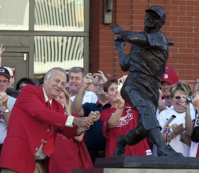 Stan Musial strikes a pose after a rededication of his statue at the new Busch Stadium in 2006. (File Associated Press / The Spokesman-Review)