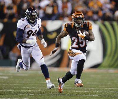 Giovani Bernard ran for 36 yards and caught five passes for 45 and a touchdown for Bengals. (Associated Press)