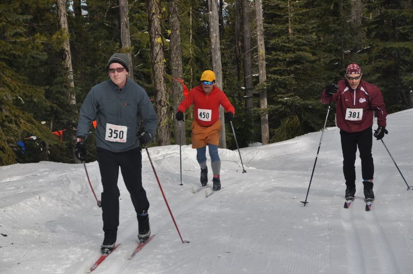 Nordic skiers race to the Junction 5 area of the 10K Langlauf cross-country course at Mount Spokane on Feb. 13, 2011. (Rich Landers)