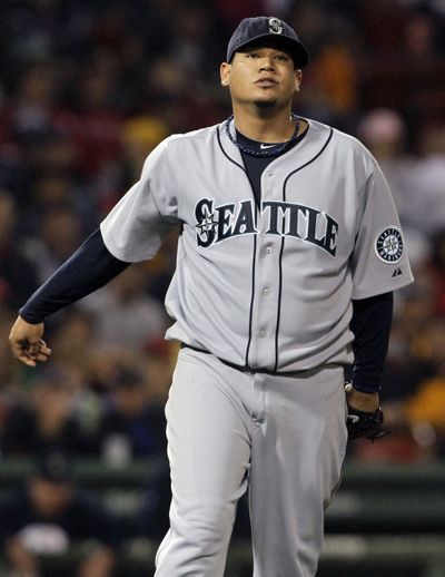 Felix Hernandez became the third-youngest pitcher to reach 1,000 strikeouts since 1952. (Elise Amendola / Associated Press)