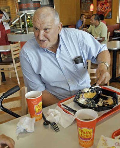 
Robert Bowman, a 67-year-old retired postal worker, eats at the newly opened El Pollo Loco Resturant that features Mexican-style grilled chicken, Associated Press
 (Associated Press / The Spokesman-Review)