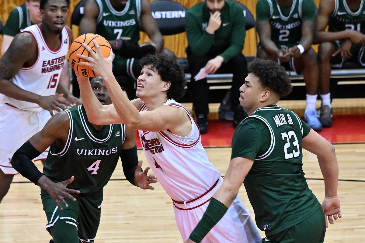 Eastern Washington forward Alton Hamilton IV (4) looks to the basket as Portland State Vikings center Tre-Vaughn Minott (4) defends during the first half of a college basketball game, Thursday, Jan. 22, 2026, at EWU.  (Colin Mulvany/The Spokesman-Review)