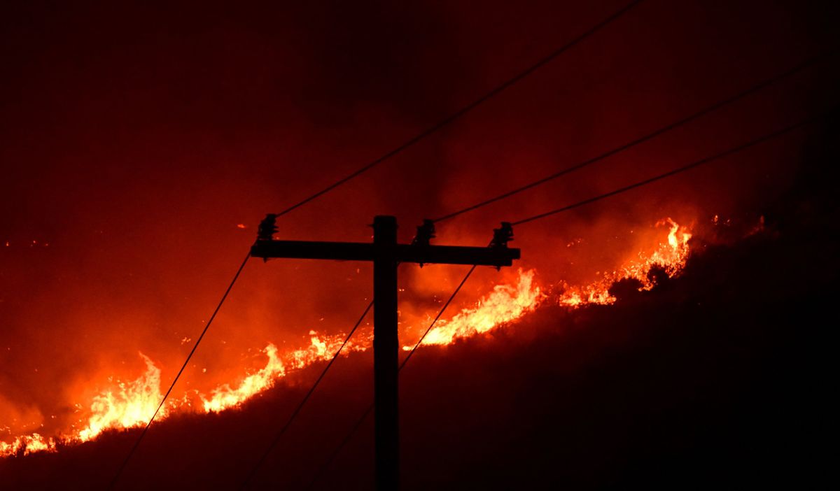The Fairview fire burns behind power lines near Hemet, Calif., on Sept. 6, 2022.  (Getty Images)