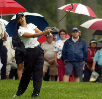 
Michelle Wie watches her shot during match play at the men's Amateur Public Links on Wednesday.
 (Associated Press / The Spokesman-Review)