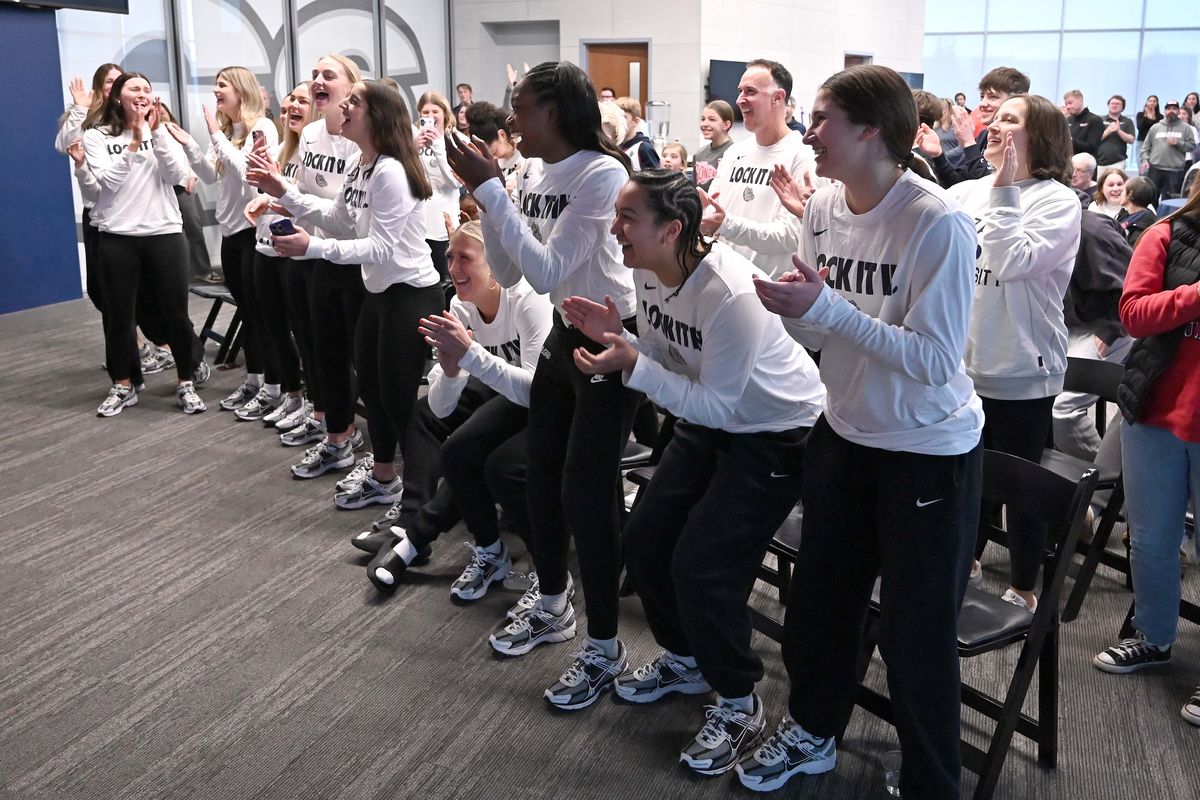 Gonzaga players celebrate during the NCAA Tournament Selection Show on Sunday at the McCarthey Athletic Center. (James Snook)