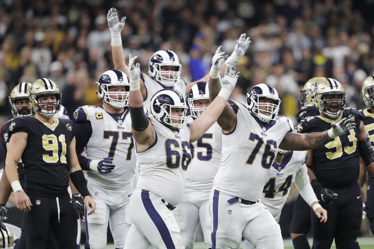 Los Angeles Rams players celebrate after overtime of the NFL football NFC championship game against the New Orleans Saints, Sunday, Jan. 20, 2019, in New Orleans. The Rams won 26-23. (Gerald Herbert / Associated Press)