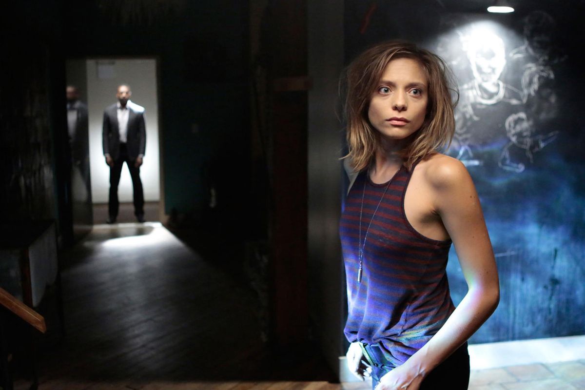 Lizzie Brochere, right, and David Ajala in USA Network’s “Falling Water.” (USA Network)