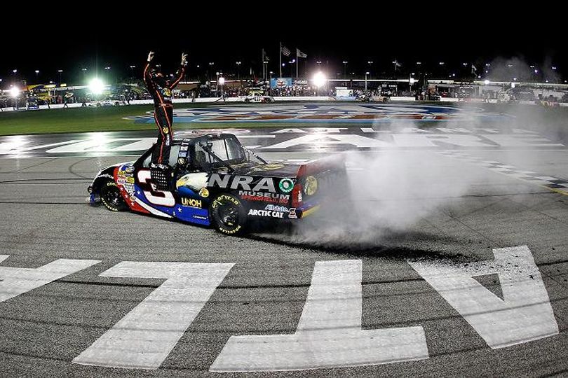 Ty Dillon, driver of the #3 Bass Pro Shops/Tracker Boats Chevrolet, celebrates after he won the NASCAR Camping World Truck Series Jeff Foxworthy's Grit Chips 200 at Atlanta Motor Speedway on August 31, 2012 in Hampton, Georgia. (Photo by Wesley Hitt/Getty Images for NASCAR) (Wesley Hitt / Getty Images North America)