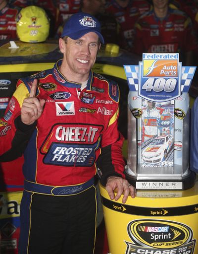 Carl Edwards came out on top in what proved to be a controversial finish at Richmond International. (Associated Press)
