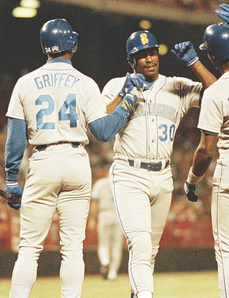 Ken Griffey Sr. and Jr. become the first father-son duo to ever