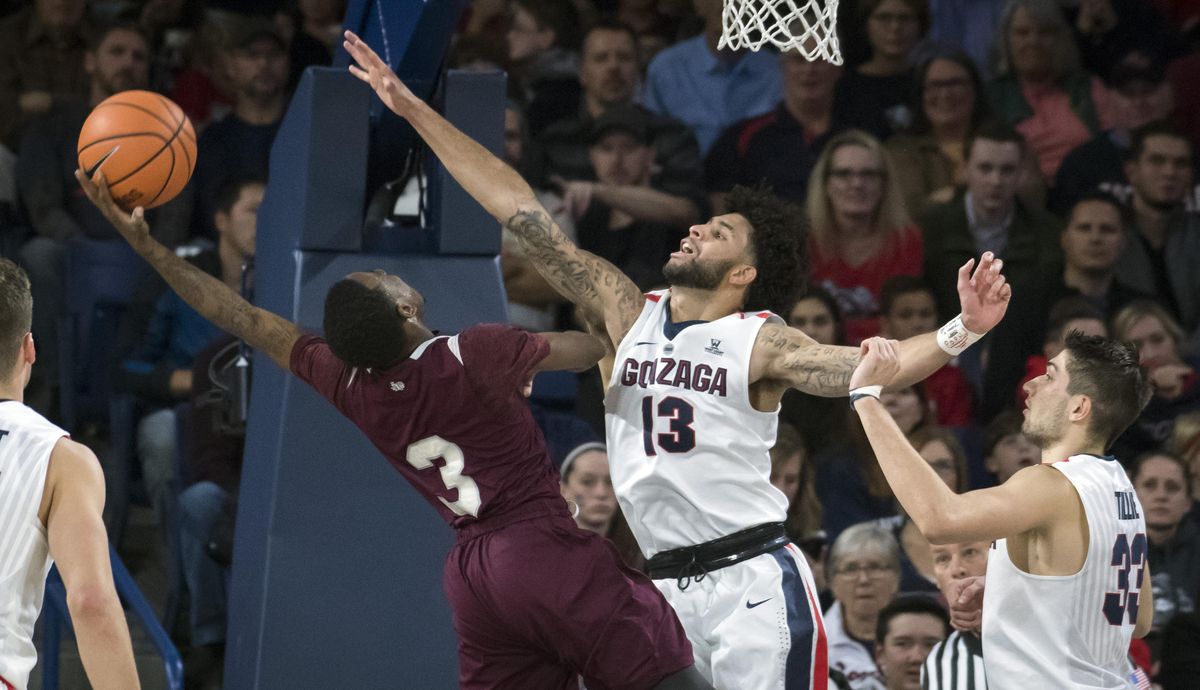 Gonzaga guard Josh Perkins (13) defends against a shot by Texas Southern guard Demontrae Jefferson (3) during the first half of a college basketball game, Fri. Nov. 10, 2017, in the McCarthey Athletic Center. (Colin Mulvany / The Spokesman-Review)