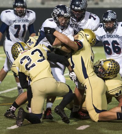 Mead and Mt. Spokane would still play each other under the new alignment, but their game would not count in league standings. (Colin Mulvany)