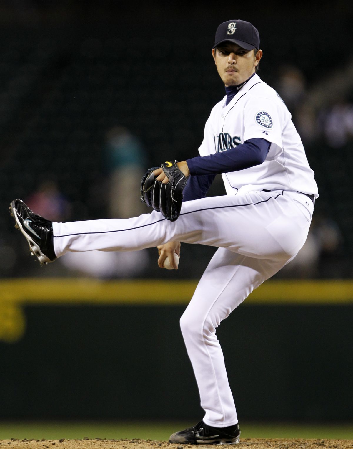 Seattle’s Hisashi Iwakuma won his third straight start to close the year, allowing six hits while striking out seven. (Associated Press)