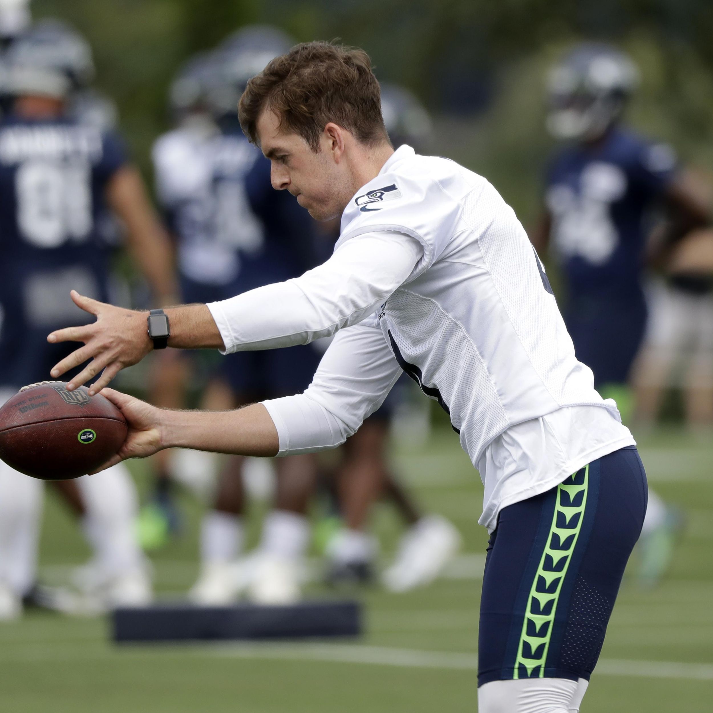 Seattle Seahawks punter Michael Dickson kicks a ball before the