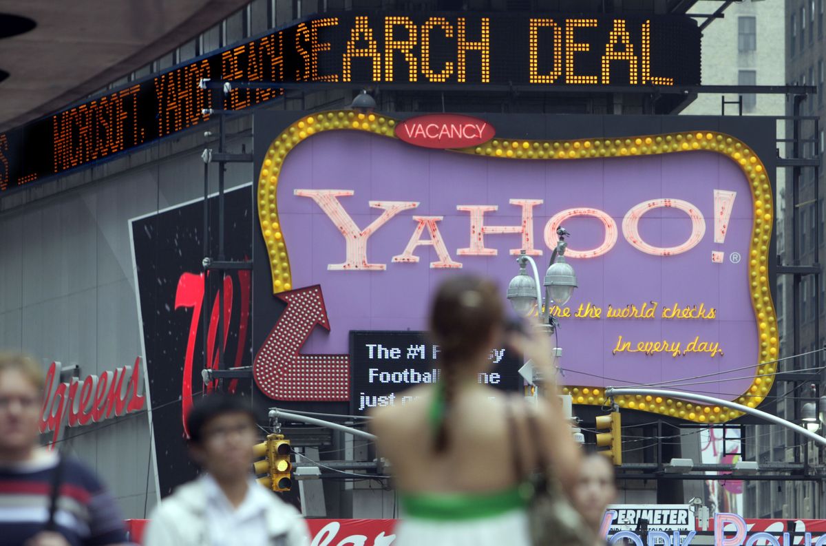 The news headline "zipper" in New York’s Times Square announces a Microsoft deal with Yahoo. Microsoft Corp. has finally roped Yahoo Inc. into an Internet search partnership, capping a convoluted pursuit that dragged on for years and finally setting the stage for them to make a joint assault against the dominance of Google Inc.  (Associated Press / The Spokesman-Review)