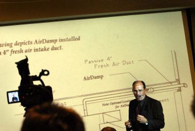 
Professor Max Kirk of the School of Architecture and Construction Management explains his AirDamp invention on Thursday at WSU in Spokane. 
 (Brian Plonka / The Spokesman-Review)