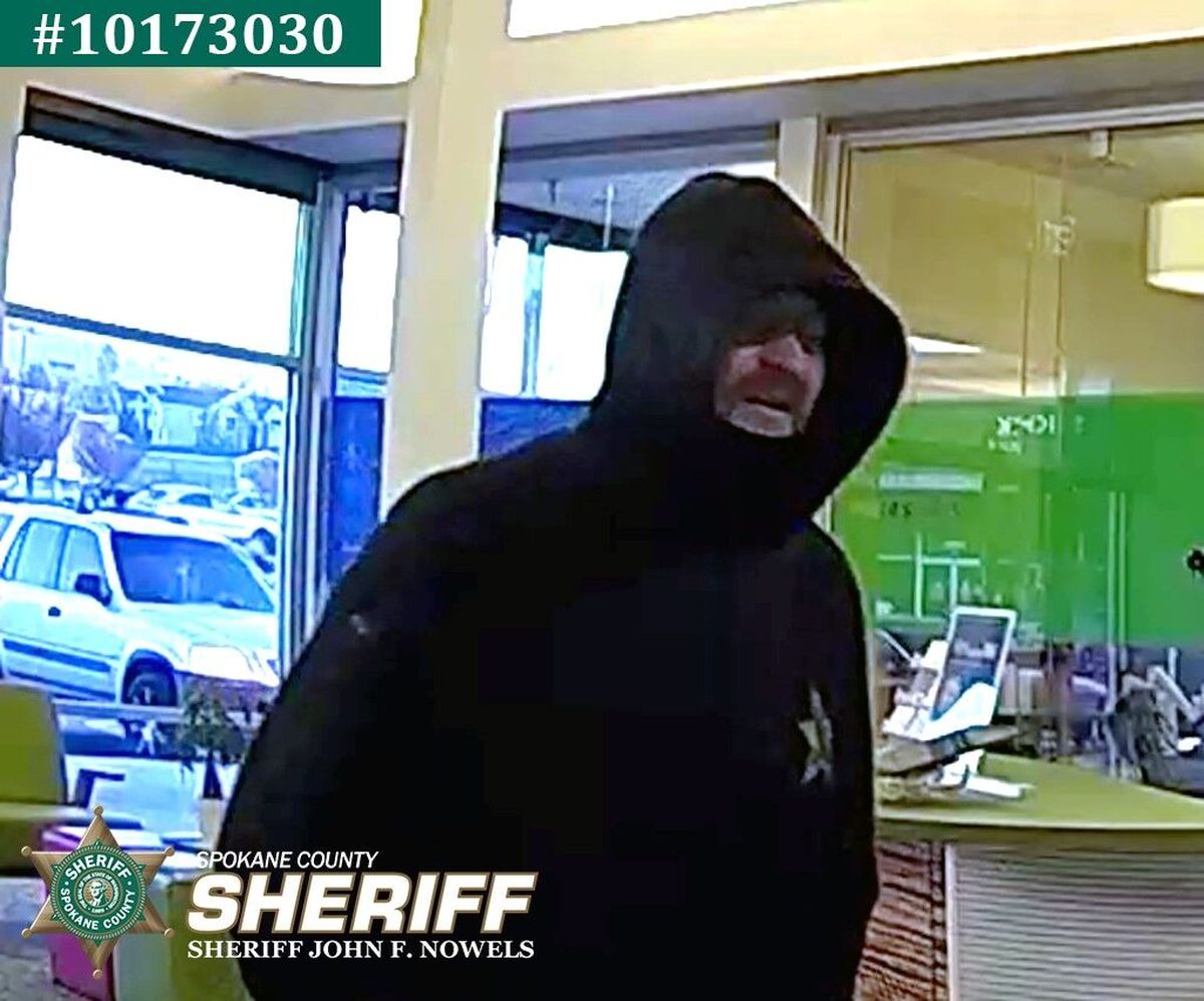 The Spokane County Sheriff’s Office is asking for the public’s help in identifying this “possible person of interest” in a South Hill bank robbery Nov. 17.  (Courtesy of Spokane County Sheriff