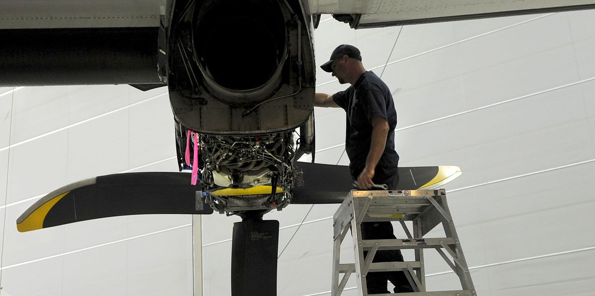 Technician Jason Rice works on a Pratt & Whitney 127 turboprop engine at Empire Aerospace in Hayden on Oct. 5. (Kathy Plonka)