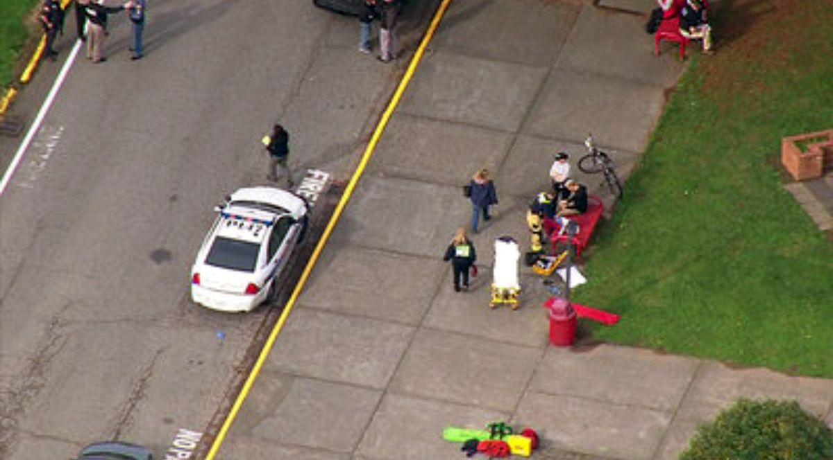 This image made from a video provided by KOMO shows emergency personnel responding after reports of a shooting at Marysville-Pilchuck High School in Marysville, Wash., Friday, Oct. 24, 2014. (Komonews.com)