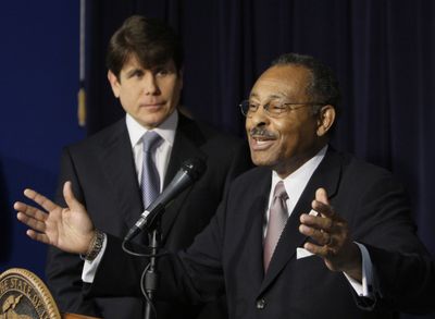 Former Illinois Attorney General Roland Burris addresses the media in Chicago on Dec. 30 after being appointed by Gov. Rod Blagojevich, left, to fill President Barack Obama’s U.S. Senate seat. (Associated Press / The Spokesman-Review)