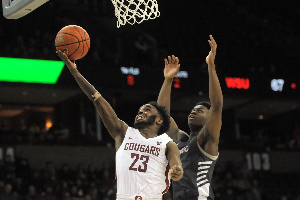 WSU's Ahmed Ali (23) goes for a shot against Santa Clara during the second period of the game at the Spokane Arena on Saturday, Dec. 29, 2018. (Kathy Plonka / The Spokesman-Review)