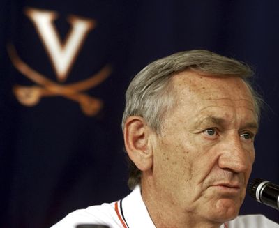 Then-Virginia NCAA college football coach George Welsh speaks at a news conference in Charlottesville, Va. in 2000. Welsh, who coached football at Virginia for 19 years and retired as the Atlantic Coast Conference's career victories leader, has died. The school made the announcement in a release Friday, Jan. 4, 2019, saying Welsh's family says he died peacefully in Charlottesville on Wednesday. He was 85. (WAYNE SCARBERRY / Associated Press)