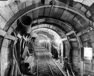 On December 27, 1950 the Spokane Daily Chronicle featured this photo of the giant tunnel that was being constructed under the north side of Spokane.  About 70 workers entered the tunnel, which was built to house the city's intercepting sewer,  each day during the construction.   