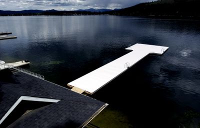 The concrete pier at Lloyd Herman’s Liberty Lake home is one of the unauthorized structures on his property that violates shoreline rules. The state Court of Appeals has upheld a $30,000 fine over the violations. (File / The Spokesman-Review)