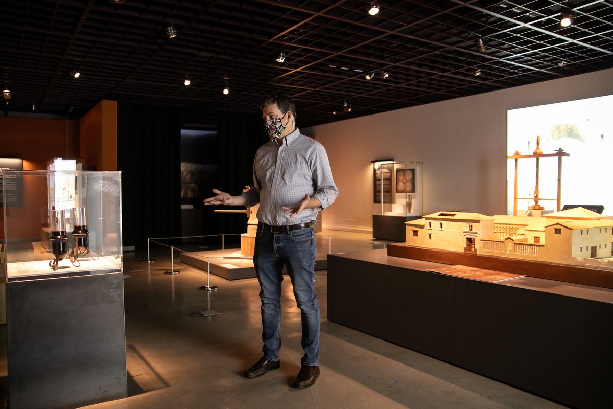 Wes Jessup, executive director of the Northwest Museum of Arts and Culture, walks through "Pompeii: The Immortal City" exhibit at the empty museum while it is closed due to coronavirus on July 13, 2020. The museum shut down in late March and won