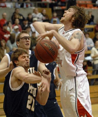 
EWU's Paul Butorac, right, has the ball stripped away by Montana State's Carson Durr during the first half. 
 (Dan Pelle / The Spokesman-Review)