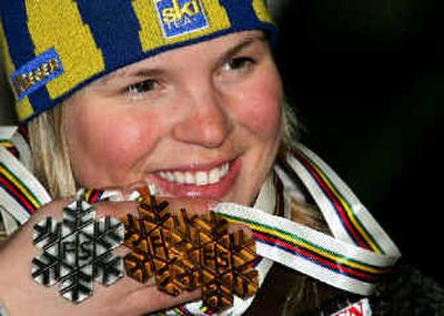
Sweden's Anja Paerson won Tuesday's giant slalom gold, giving her three worlds medals. 
 (Associated Press / The Spokesman-Review)