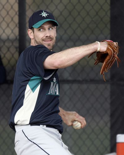 Mariners pitcher Cliff Lee had his first bullpen session Wednesday.  (Associated Press)