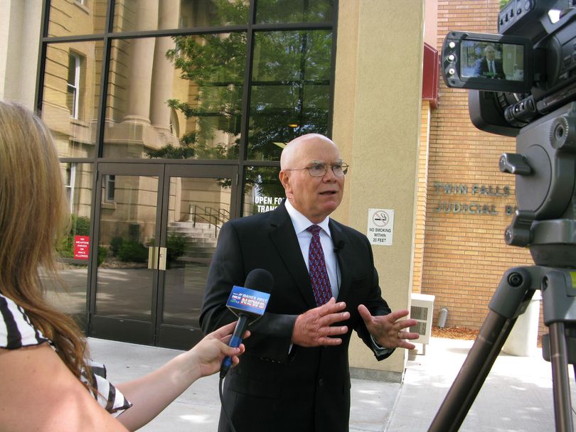 Christ Troupis talks with reporters outside the Twin Falls county courthouse on Tuesday (Betsy Russell)