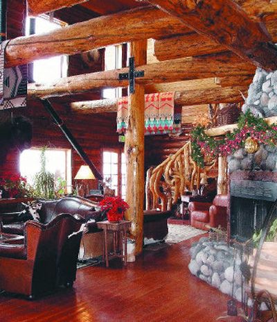 
The Bar N lodge, with its floor-to-ceiling, three-story stone chimney, offers a spacious, inviting area for guests to relax. 
 (Photo courtesy of Jean Arthur / The Spokesman-Review)