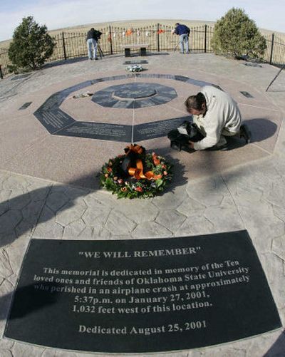 
Oklahoma State University honors the 10 members of the basketball traveling party who were killed in a plane crash. 
 (Associated Press / The Spokesman-Review)