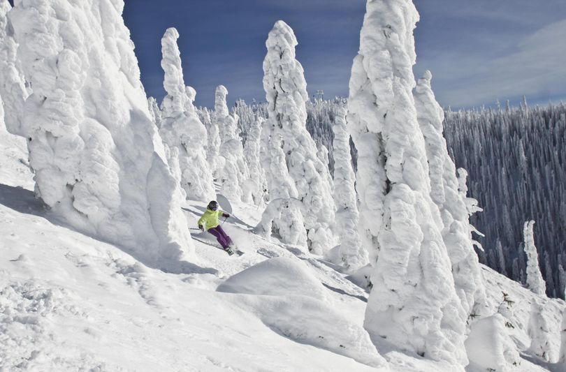 A skier turns among the snow ghosts in the upper Hellroaring Basin at Whitefish Mountain Resort. (COURTESY OF WHITEFISH MOUNTAIN RESORT / Courtesy of Whitefish Mountain Resort)