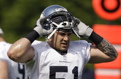 Seattle Seahawks’ Pro Bowl Linebacker Lofa Tatupu remains a crowd favorite despite recent run in with the law.  (Associated Press / The Spokesman-Review)