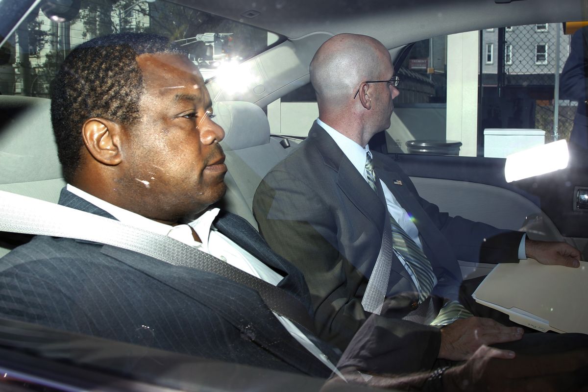 Trenton Mayor Tony Mack, left, is driven in custody into the federal courthouse in Trenton, N.J., Monday, Sept. 10, 2012, after agents arrested him earlier Monday as part of an ongoing corruption investigation into bribery allegations related to a parking garage project that was concocted as part of an FBI sting operation. (Mel Evans / Associated Press)