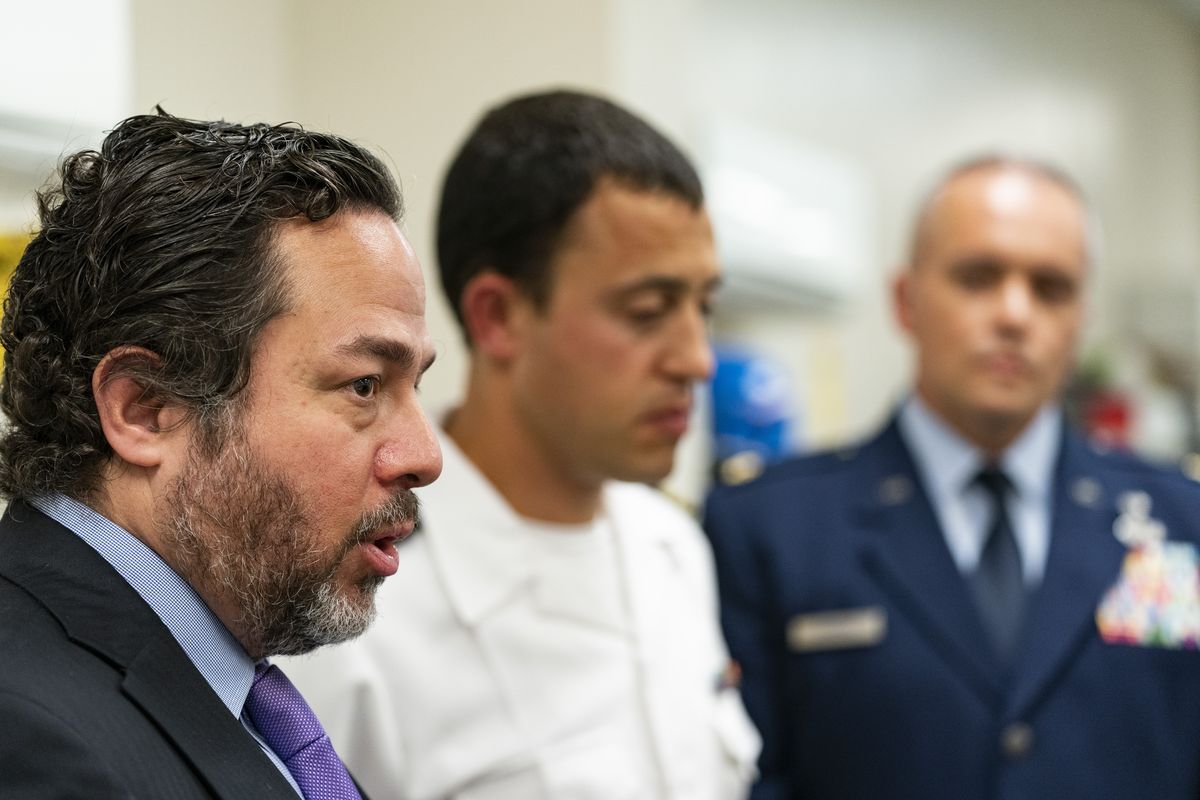 Attorneys Brian Bouffard, left, accompanied by U.S. Navy Lt. Cmdr. Aaron Shephard, and U.S. Air Force Major Jason Cordova, speak with reporters after the second day of an arraignment hearing for their client Malaysian defendant Mohammed Nazir bin Lep, Tuesday, Aug. 31, 2021, in Guantanamo Bay Naval Base, Cuba. Three prisoners at the Guantanamo Bay detention center had their second day in court Tuesday after being held by the U.S. for 18 years without charge in connection with the deadly 2002 Bali nightclub bombings and other plots in Southeast Asia.  (Alex Brandon)