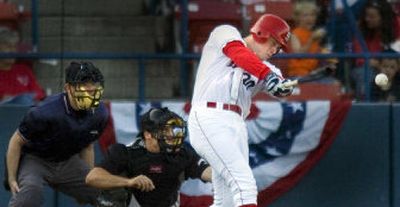 
Grant Gerrard triples to lead off the Spokane Indians' first inning Wednesday. 
 (Christopher Anderson / The Spokesman-Review)