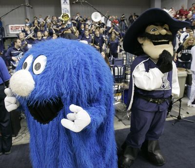 Associated Press Xavier mascots the Blue Blob, left, and D’Artagnan perform during a game against Dayton. (Associated Press / The Spokesman-Review)