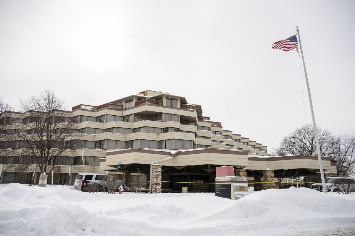 Police investigate the scene of a shooting at the Indian Lakes Hotel on Saturday, Feb. 6, 2021 in Bloomingdale, Ill. Police say one person was killed and several others were injured in a shooting at the hotel in the Chicago suburb. Police said officers who responded about 2:35 a.m. Saturday to a report of shots fired on the fifth floor of the Indian Lakes Hotel saw several people fleeing the hotel.  (Pat Nabong)