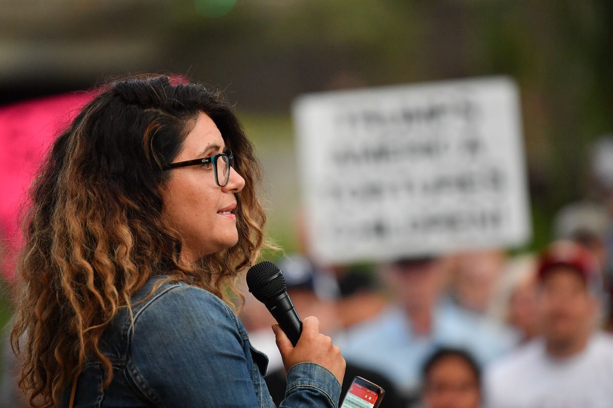 Jennyfer Mesa speaks during a "Lights for Liberty" vigil on Friday, July 12, 2019, at Riverfront Park in Spokane, Wash.   (TYLER TJOMSLAND/THE SPOKESMAN-REVIEW)