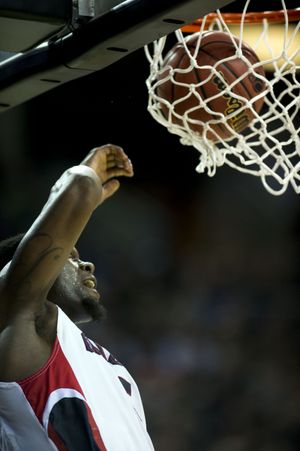 Gonzaga guard Gary Bell Jr. (5) dunks the ball in the first half of a second round NCAA men's tournament basketball game, Friday, March, 20, 2015, at KeyArena in Seattle. (The Spokesman-Review)