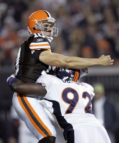Cleveland quarterback Brady Quinn threw two TDs in his first NFL start.  (Associated Press / The Spokesman-Review)