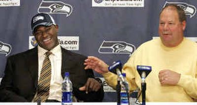 
First-round draft pick Chris Spencer meets the press with coach Mike Holmgren. 
 (Associated Press / The Spokesman-Review)