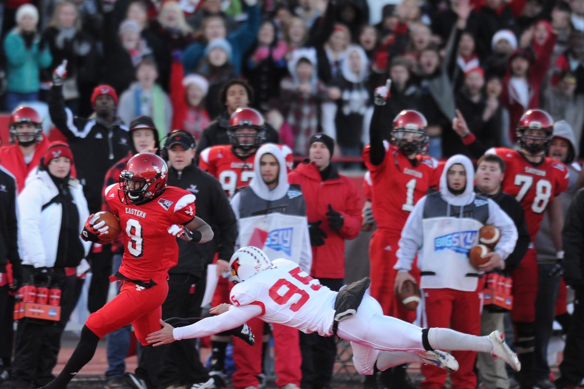 EWU’s Shaquille Hill eludes Illinois State defenders during a kick return in the first half on Saturday at Roos Field in Cheney. (TYLER TJOMSLAND PHOTOS)