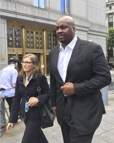 In this Oct. 10, 2017 photo, Chuck Person leaves Manhattan federal court in New York. (Larry Neumeister / Associated Press)